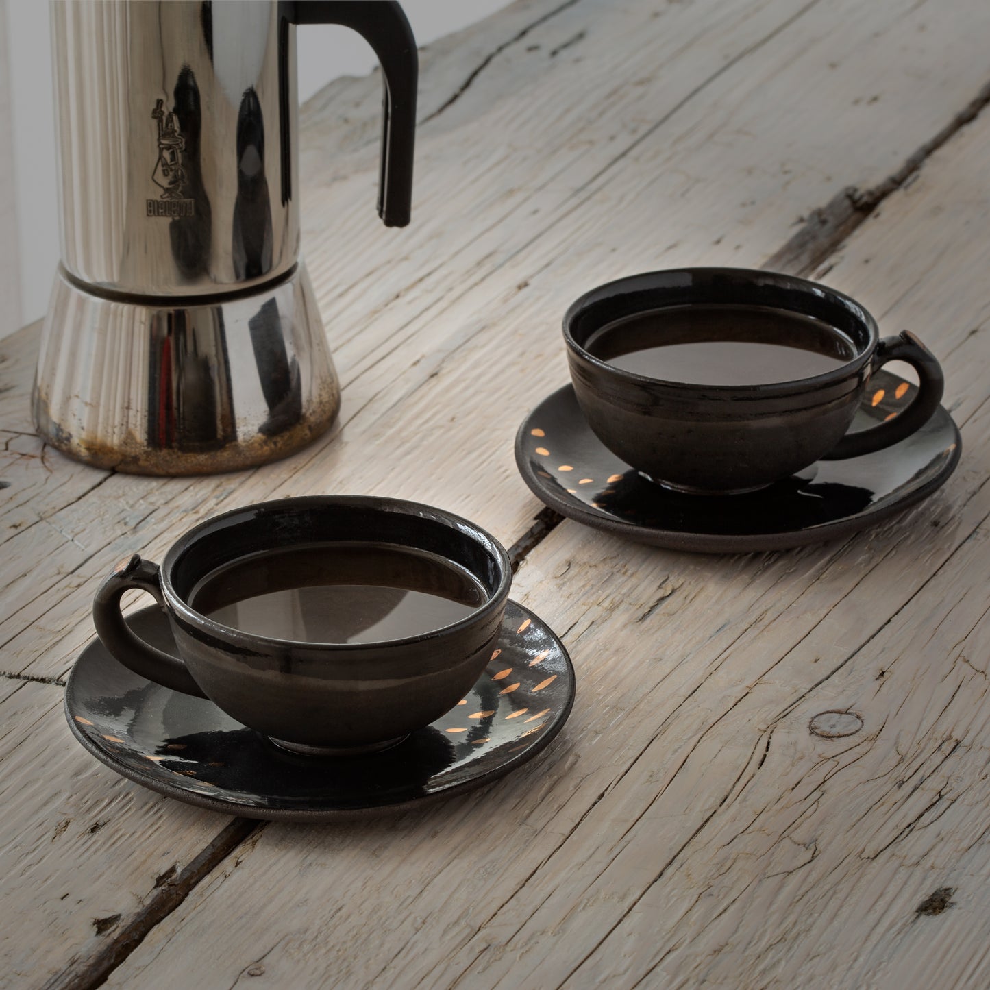 Solea black cup and saucer