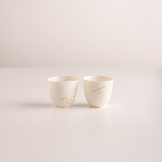 Set of two espresso cups with gold