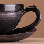 Load image into Gallery viewer, Solea black cup and saucer
