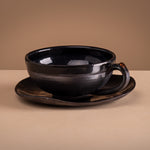 Load image into Gallery viewer, Solea black cup and saucer
