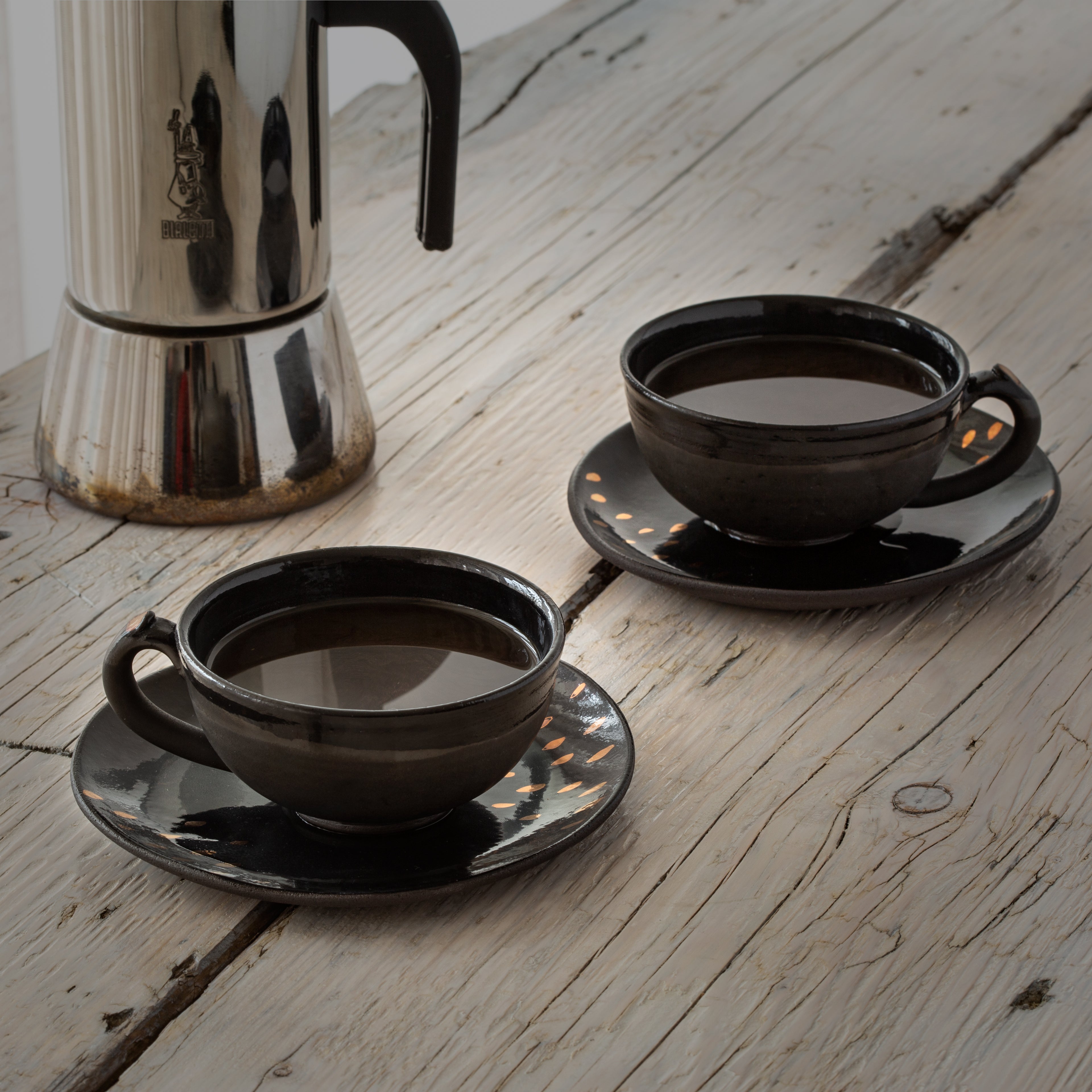 Solea black cup and saucer